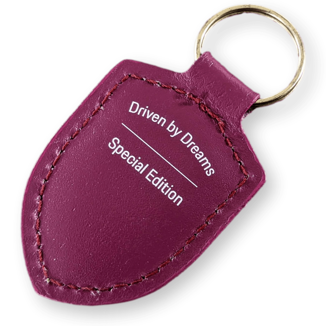 PORSCHE Driven by Dreams Badge Keyring – 75 Years