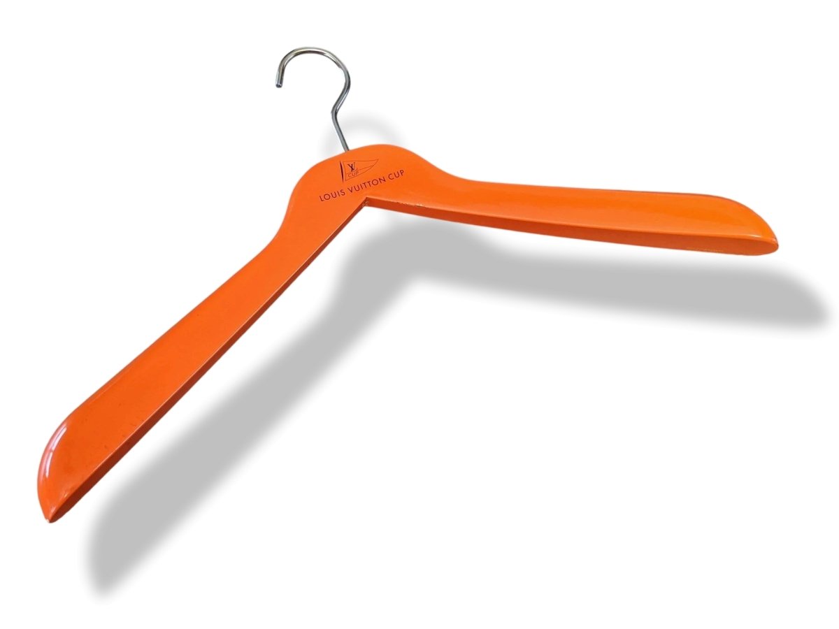 LOUIS VUITTON CUP Orange Lacquered Wood Clothing Hanger