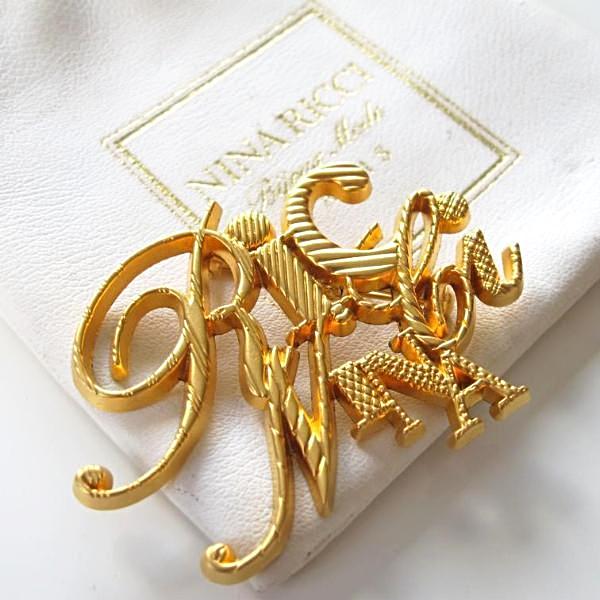 Broche arbre des anges vintage en perles et strass dorés par Nina Ricci Broche arbre des anges vintage en perles et strass dorés par Nina Ricci