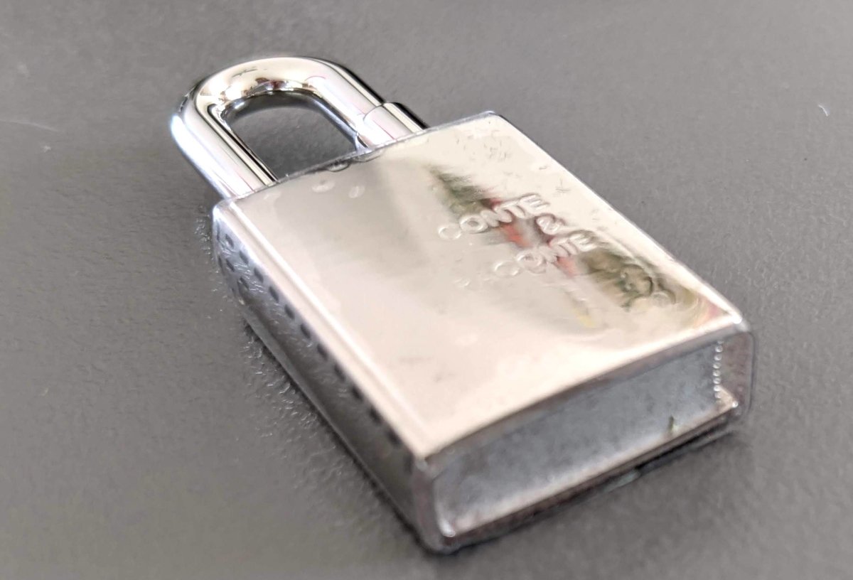 Hermes [74] CONTE ET RACONTE Cadenas Lock Charm PHW, Brand New with Pouch in Box! - poupishop
