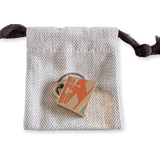 HERMES Curiosite Kelly Laque H Vibration charm