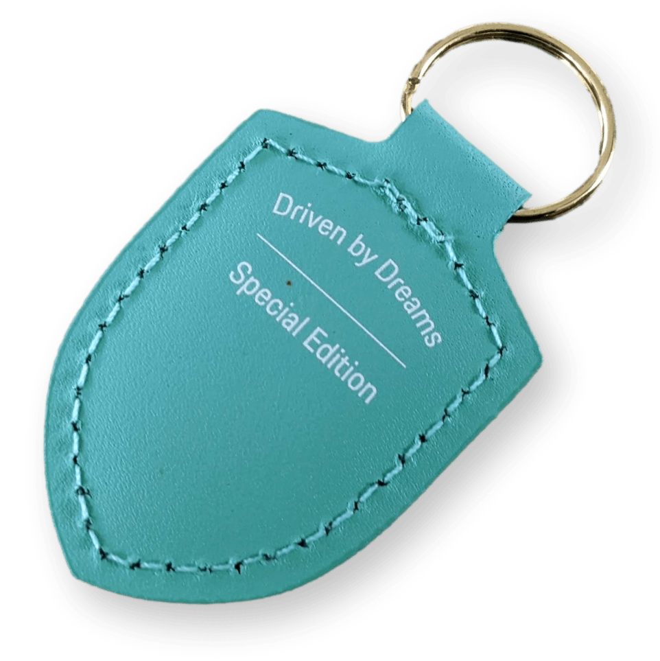 PORSCHE Driven by Dreams  Badge Keyring – 75 Years