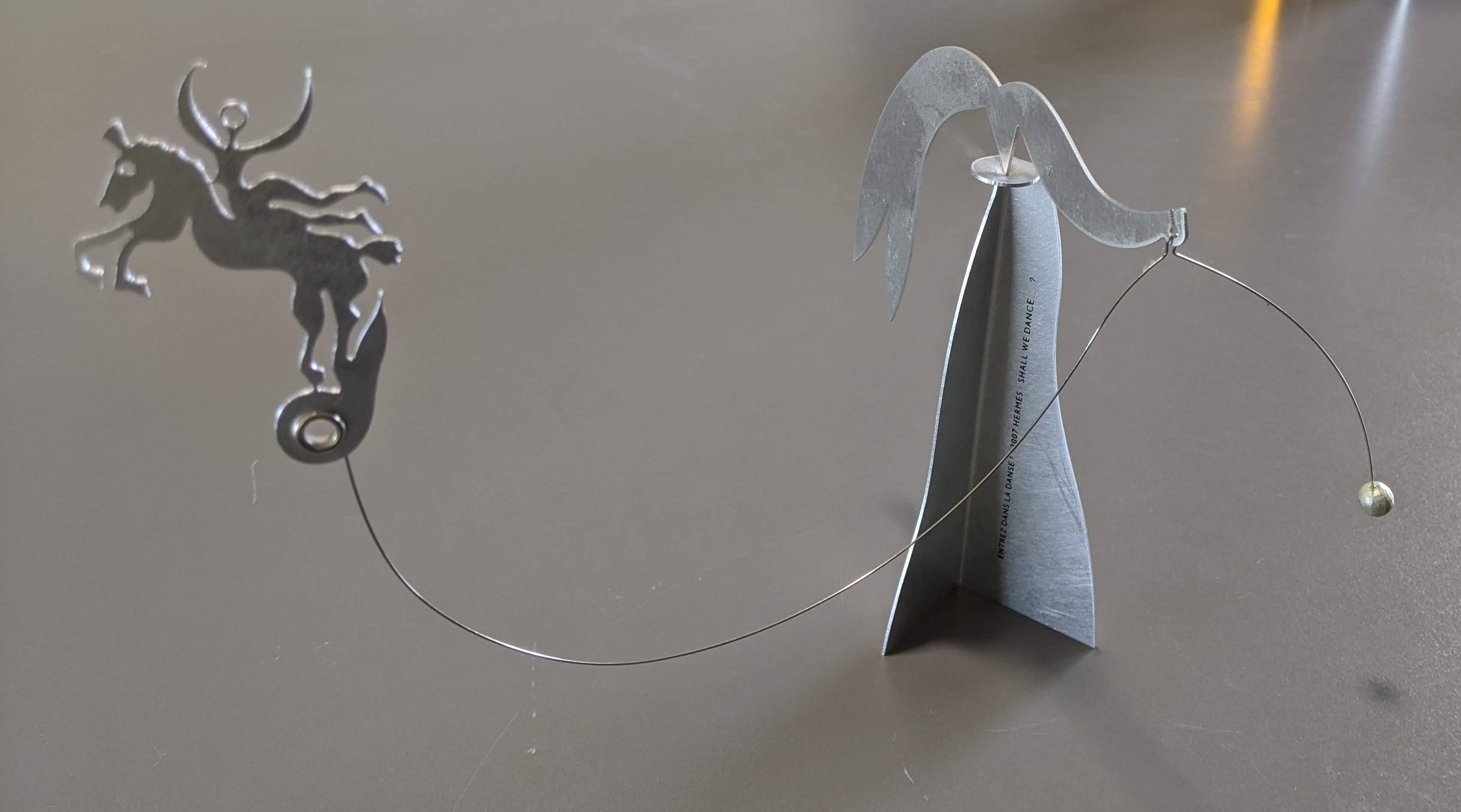 Hermes 2007 Brushed Steel / Acier Brossé Mobile "Shall we Dance? " by Pilippe Caron Mobile