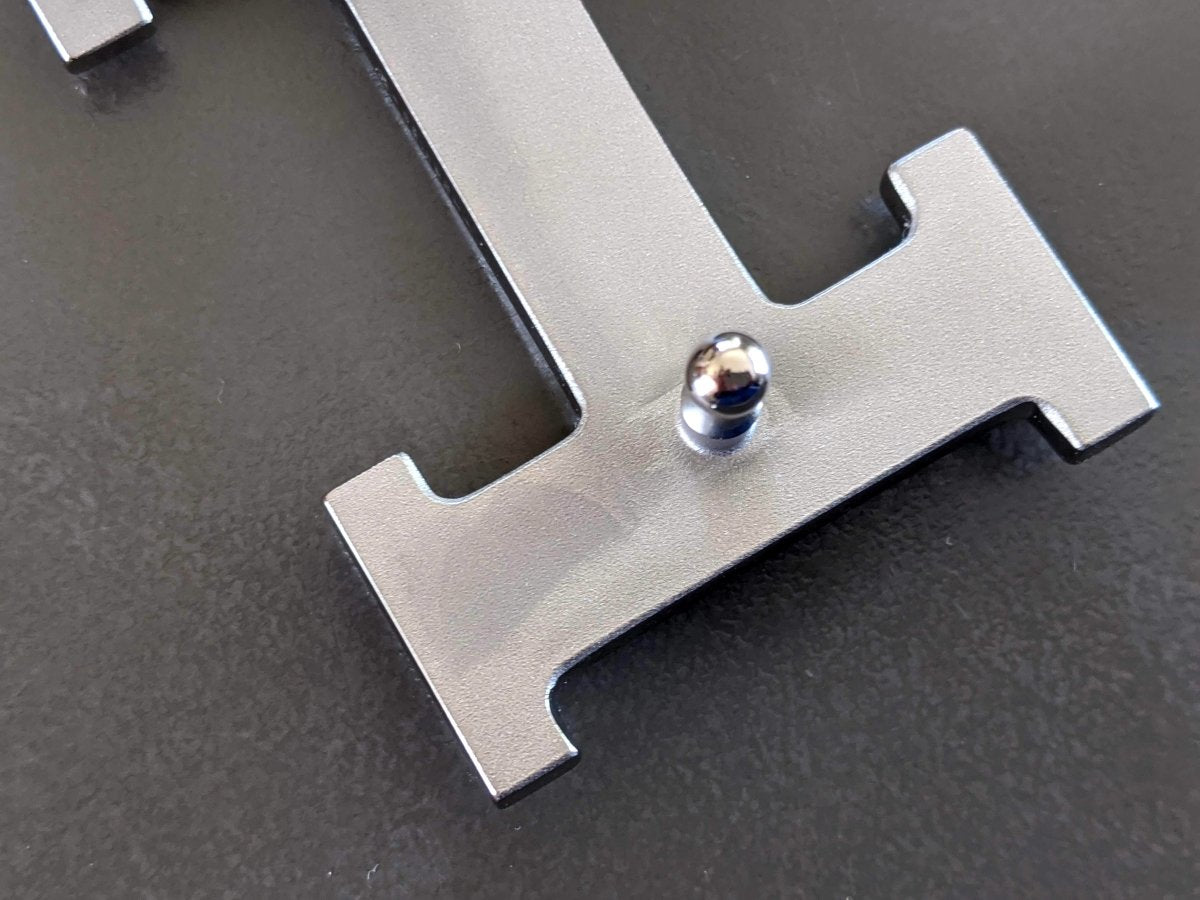 Hermes Plated Silver and Palladium Brushed Buckle H 32mm, New with darker marks on its back. - poupishop